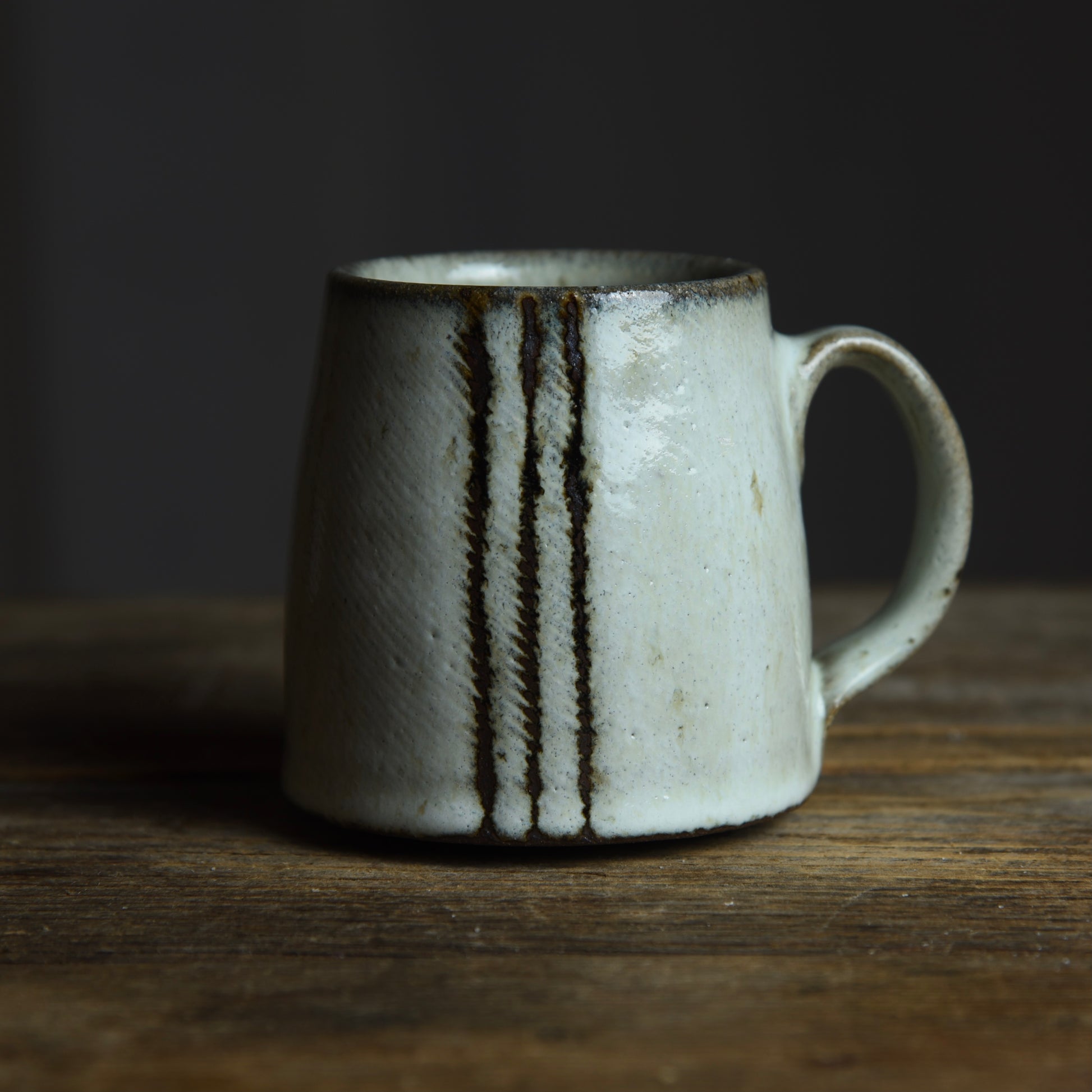 Wide-Bottom Mug in Nuka-Type Glaze with Iron Designs – Kate Gibbs Ceramics